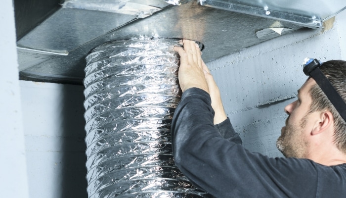 Ductwork Technician Working On Ventilation Ductwork Technician Working On Ventilation